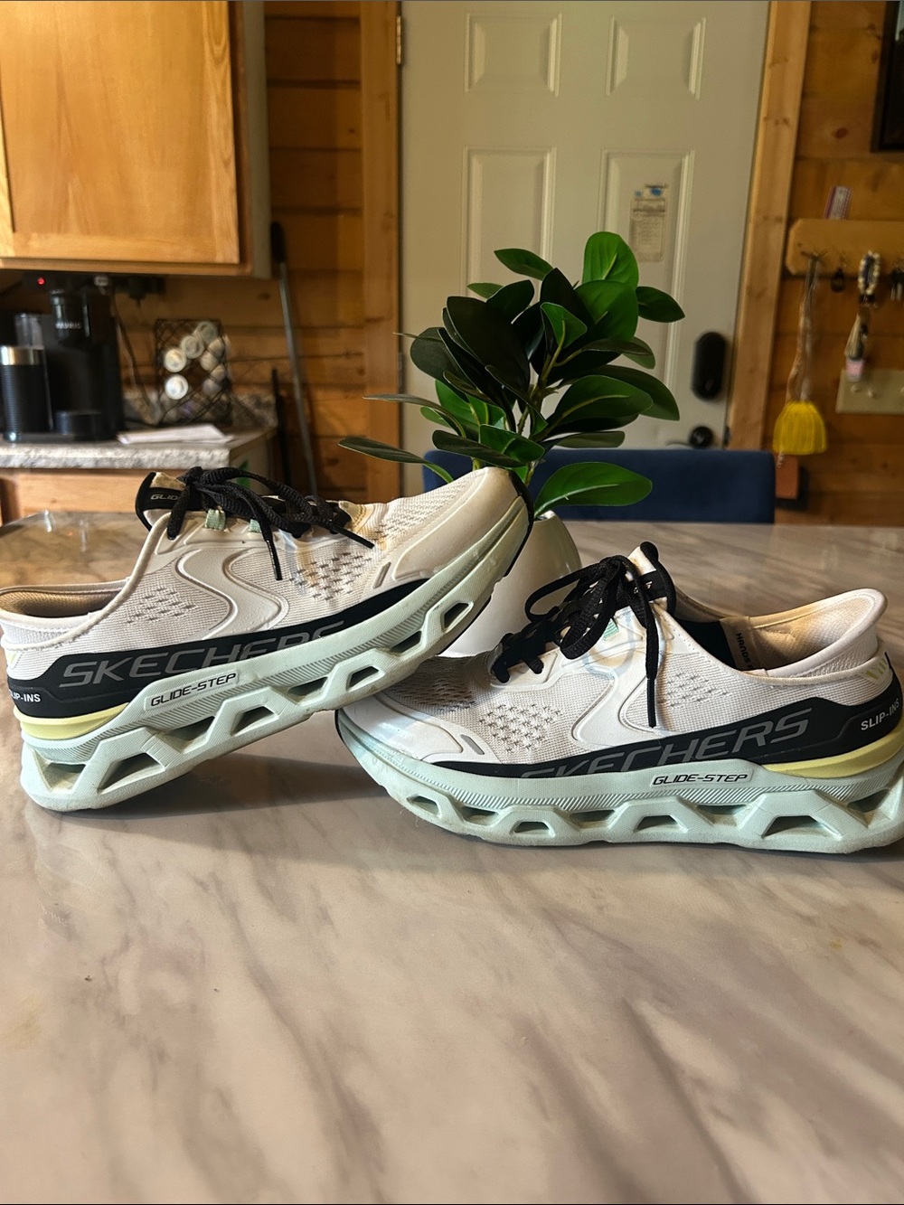 Skechers Woman’s White and Black Glide-Step Athletic Shoes